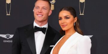 Olivia Culpo with Christian McCaffrey in a past event